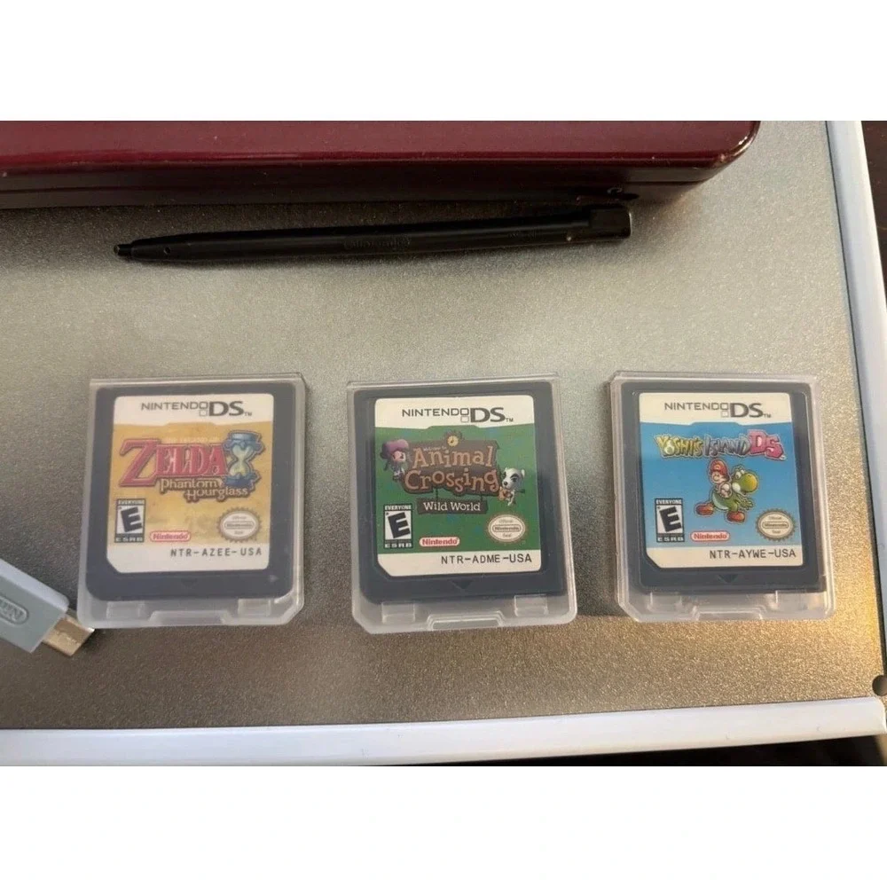 Nintendo DSI xl with three game bundle